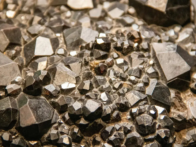 Dark metallic zinc ore crystals
