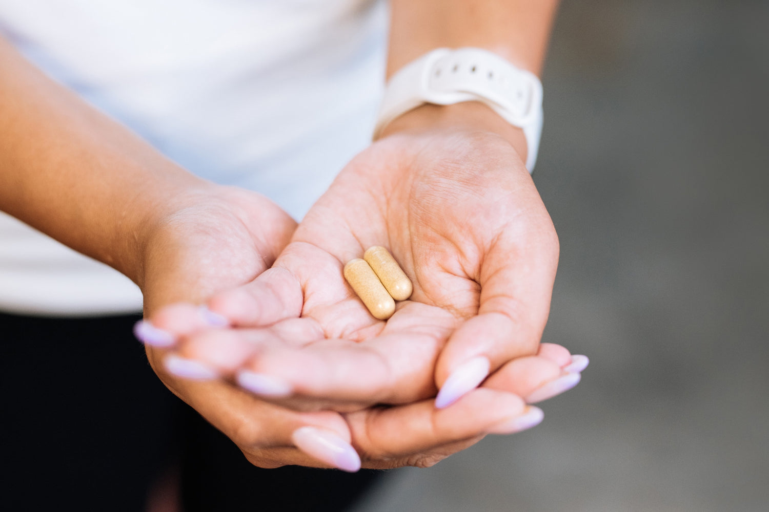 capsules in hand mood and wellbeing nooroots nootropic supplement