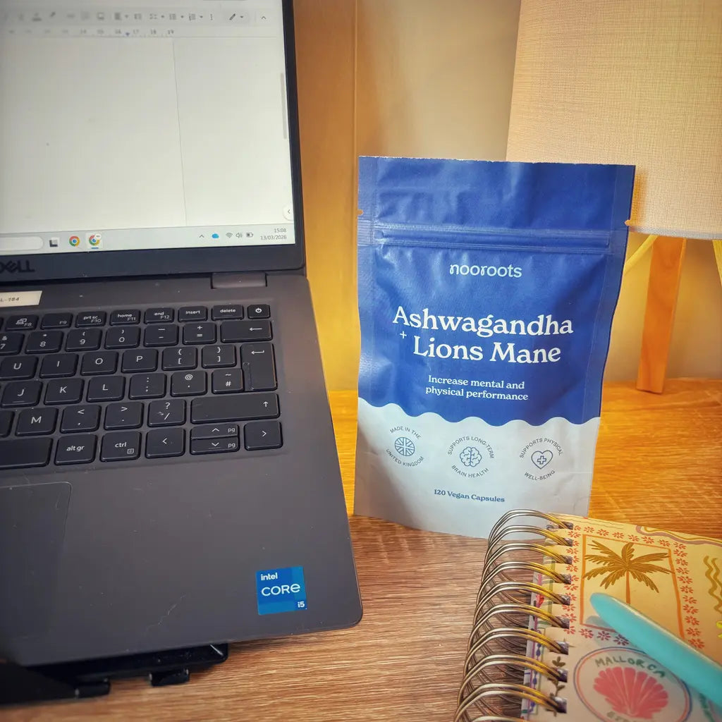 Daily supplement capsule beside breakfast and coffee
